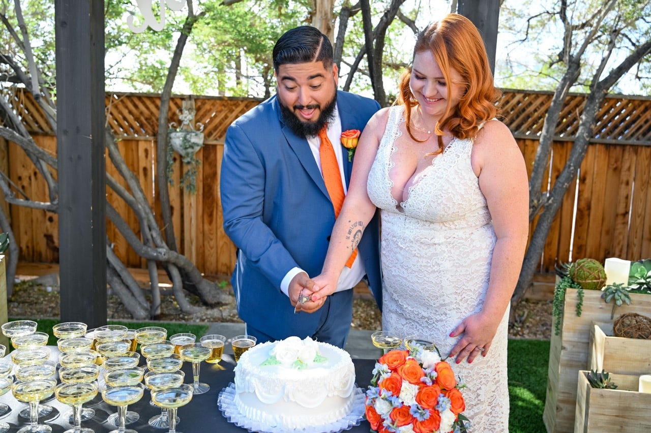 Bride and Groom cutting Las Vegas Wedding Cake at reception