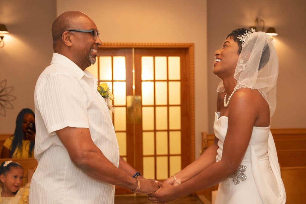 Happy bride and groom exchanging Las Vegas Wedding Vows