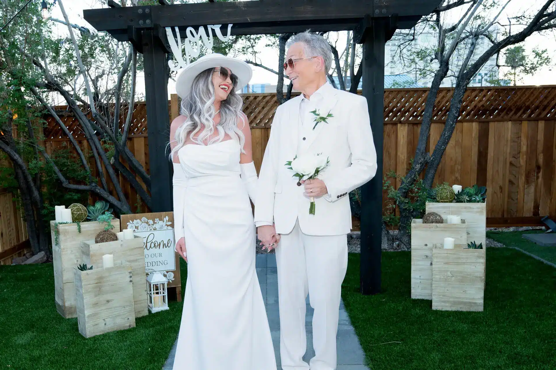 Outdoor setting of a romantic Las Vegas wedding decorated with flowers and candles